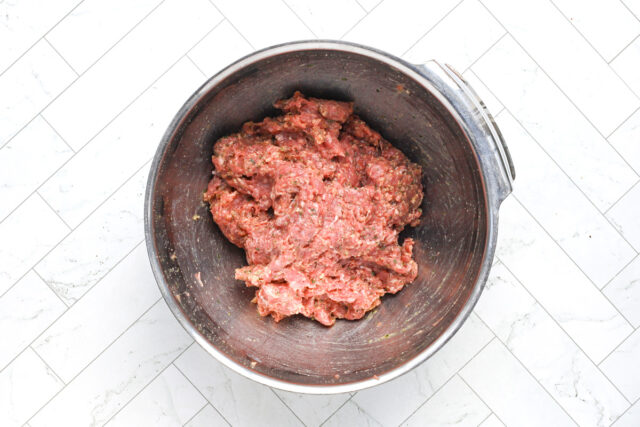 Air fryer meatball prep: making the meatball mixture.