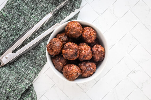 Air fryer meatballs transferred to a bow