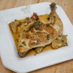 oven braised chicken on a serving plate