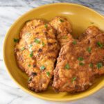 chicken francese: fried chicken breasts with lemon and wine sauce