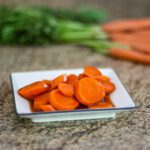 orange cointreau glazed carrots on a plate