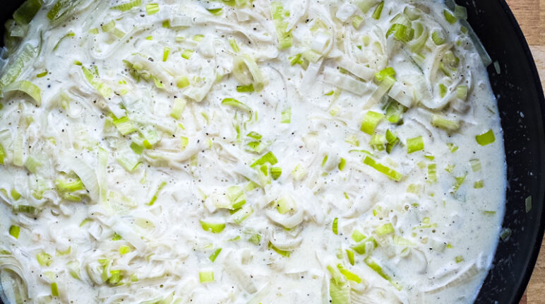 Add the cream and Parmesan cheese to the leeks and add salt and pepper to taste. Time to serve!
