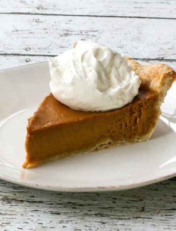 bourbon pumpkin pie with whipped cream