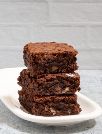 a stack of fudgy chocolate brownies