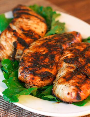 marinated and grilled turkey tenderloins on a platter