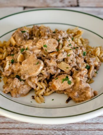ground beef stroganoff over rice with sour cream sauce and mushrooms