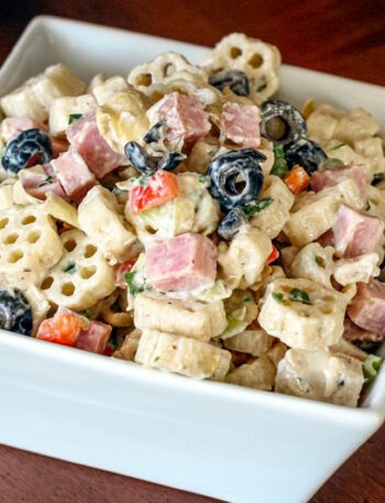 pasta salad with marinated artichokes, ham, and olives