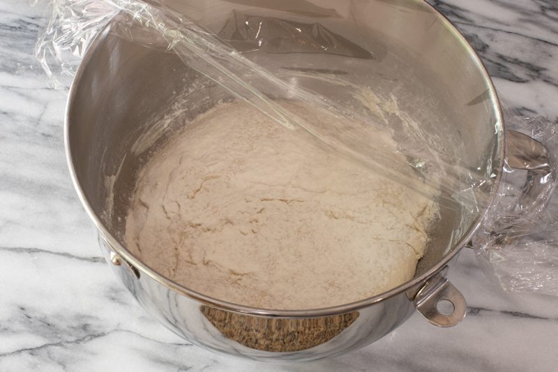 homemade pumpernickel bread dough in the mixing bowl