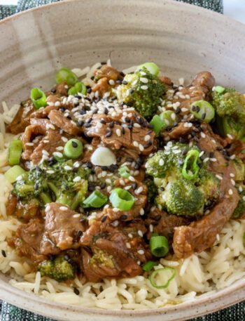 instant pot beef and broccoli in a bowl on rice