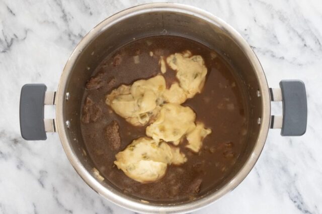 add the cream of celery soup but avoid stirring.