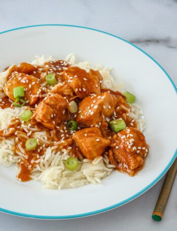 Instant Pot General Tso's chicken with sesame seeds over rice