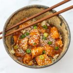 light instant pot general tso's chicken in a bowl