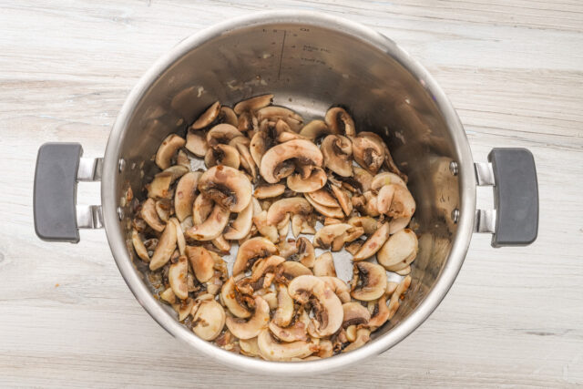 Mushrooms sautéing in the Instant Pot for mushroom risotto.
