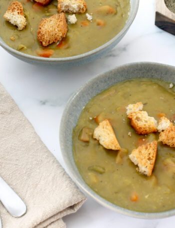 instant pot pea soup in bowls with croutons