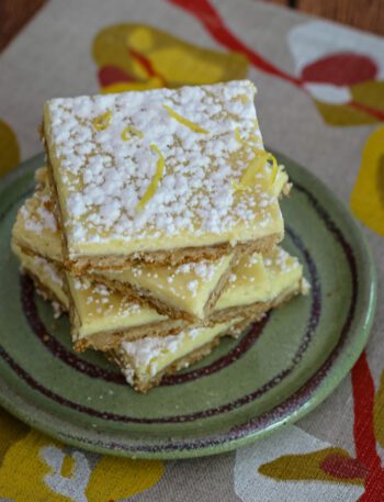 lemon bars on a plate, stacked