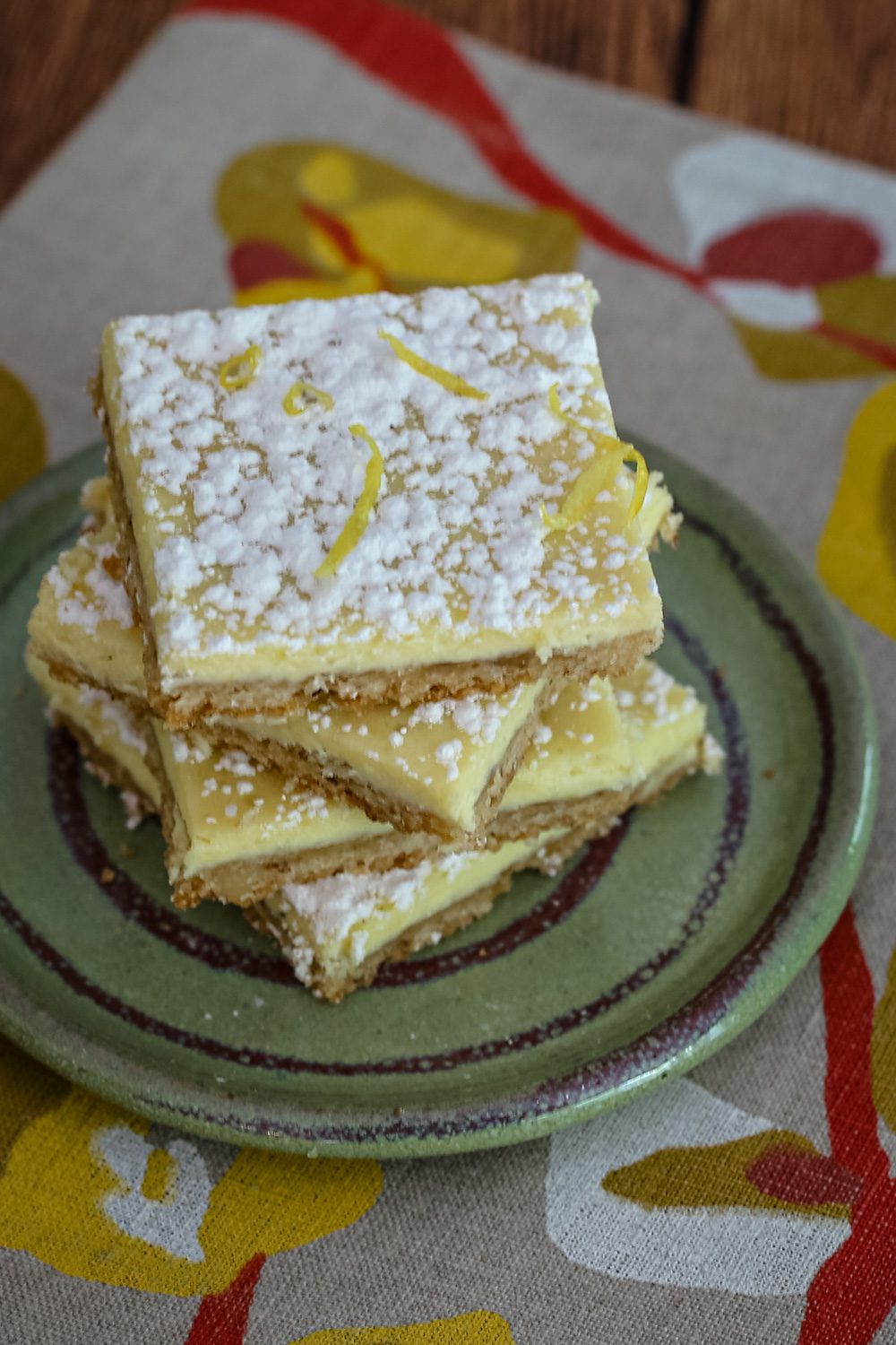 lemon bars on a plate, stacked