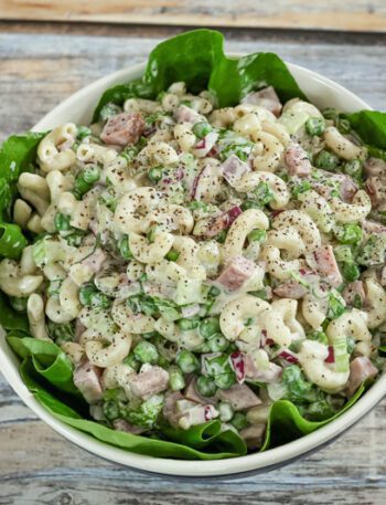 macaroni salad with ham in a serving bowl