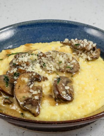 Sautéed mushrooms with butter and white wine over polenta.