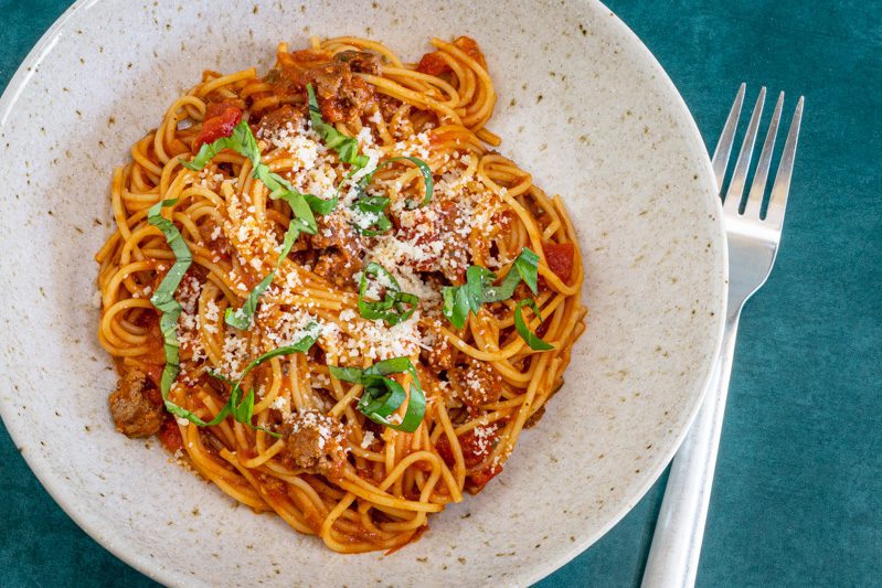 Pasta bowl with a serving of one-pot spaghetti dinner.