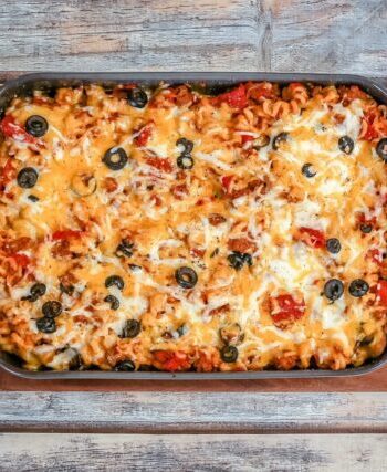 Baked pizza casserole on a cutting board