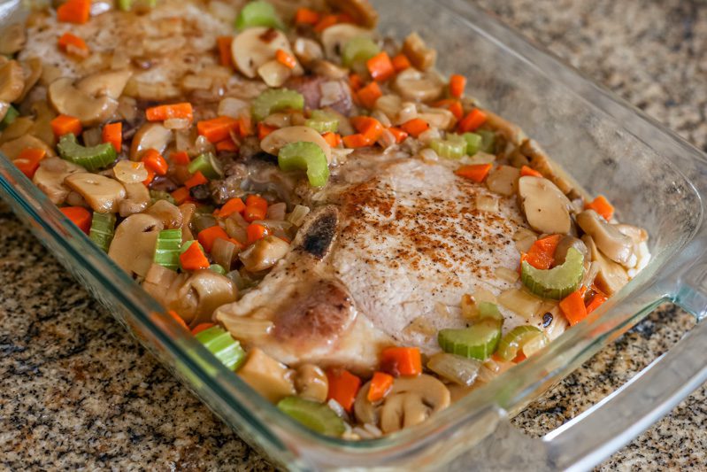 pork chop and rice casserole in the baking dish
