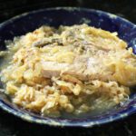 Baked pork chops with sauerkraut on a plate