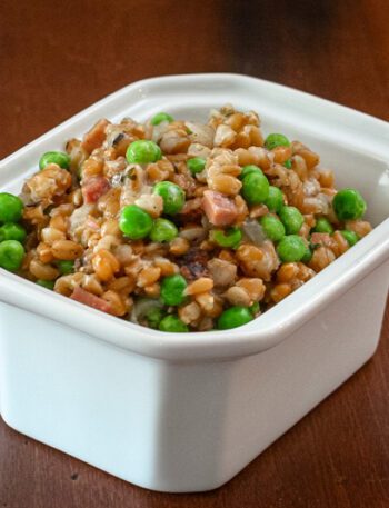 slow cooker farro pilaf in a serving dish