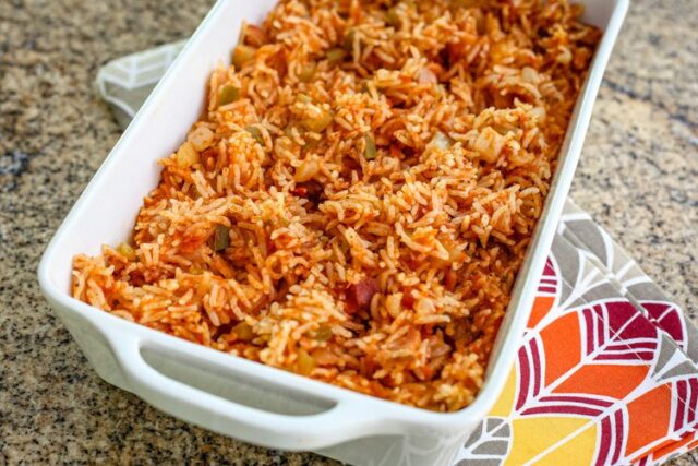A serving dish with Spanish rice.
