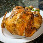 sriracha-glazed roast chicken on a platter