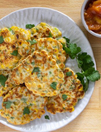 tex mex fritters on a plate with cilantro