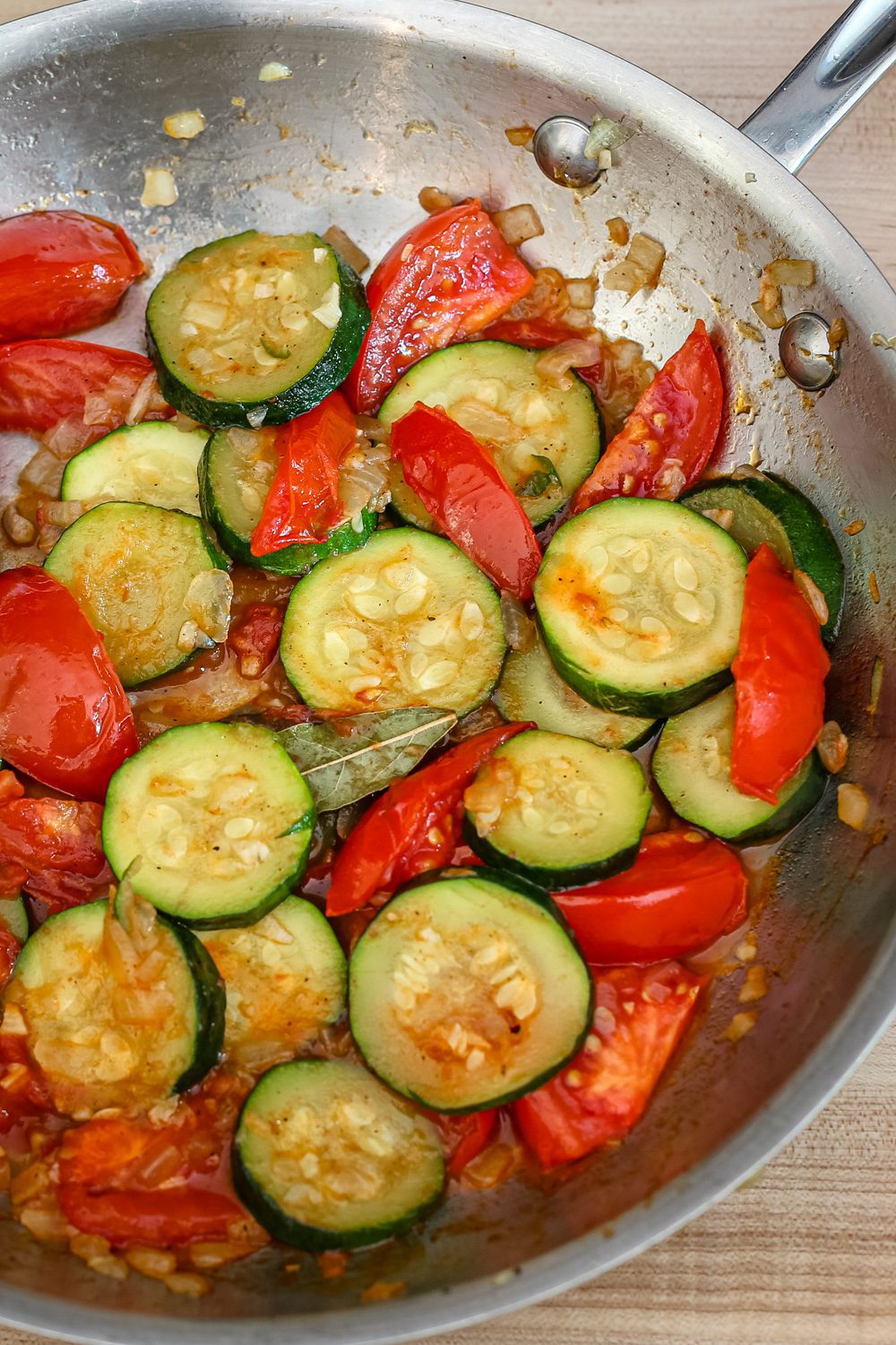 zucchini and tomatoes in a skillet