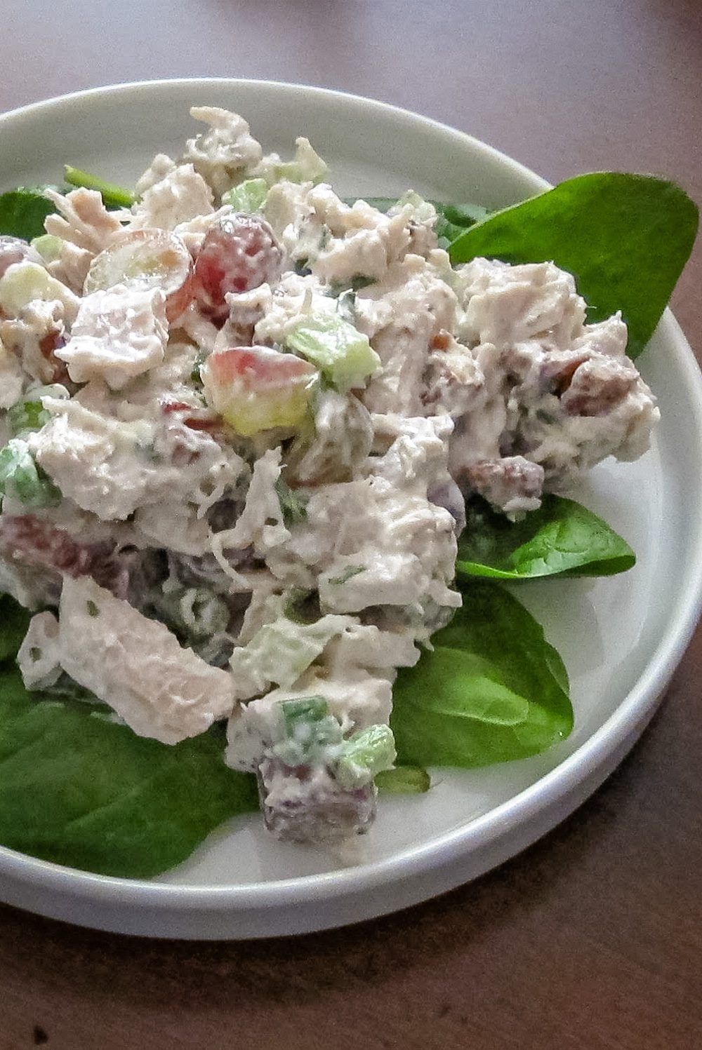 curry turkey salad with grapes on lettuce leaves